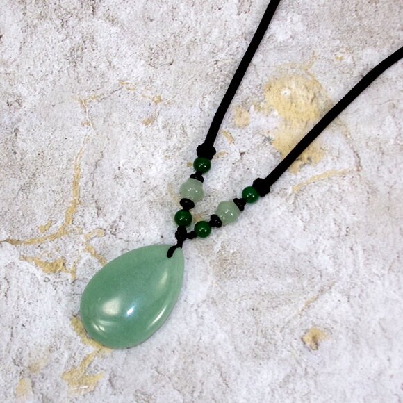 Large green aventurine stone pendant necklace in a teardrop shape on brown cord - Picture 9 of 9